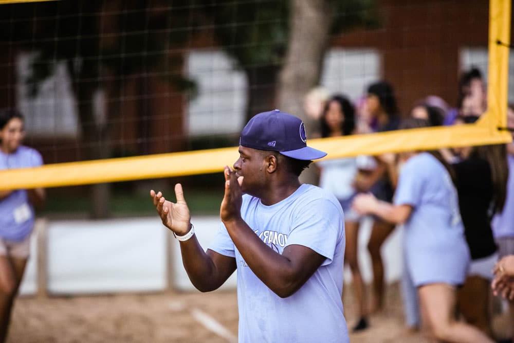 Coach giving instructions during a Howard Payne University volleyball match. | HPU